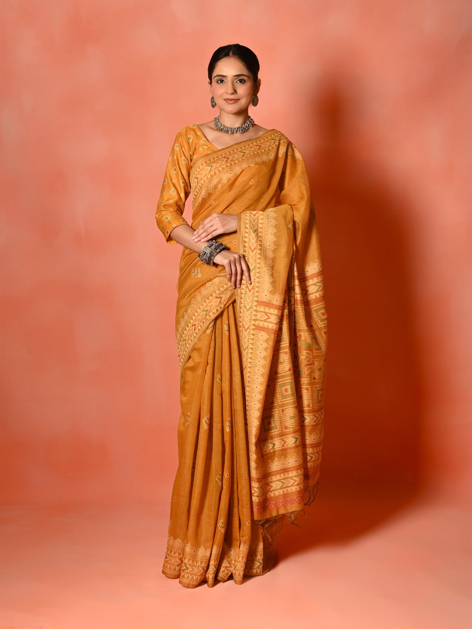 Rust Cotton Saree with Thread Weaving & Tassel Pallu